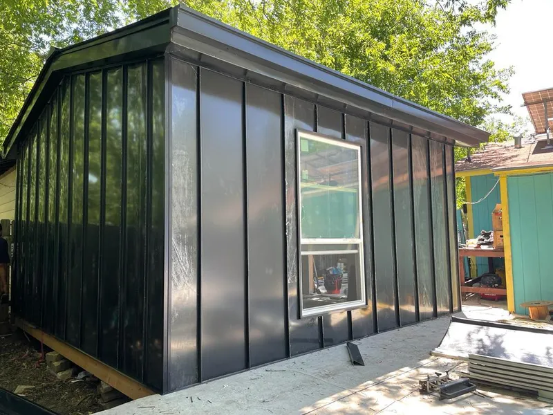 Black standing seam metal wall panels for Metal Roof Installation in Moab