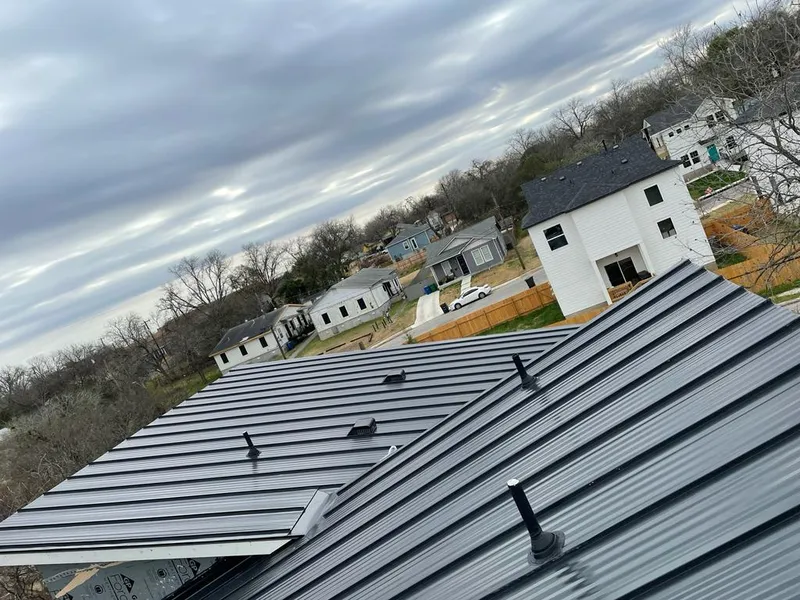 Standing seam metal roof panels with vents for Skylight Repair in Moab